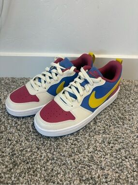 Nike Kids Low-Top Sneakers in White, Blue, Pink & Yellow